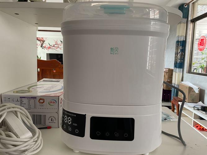 新貝嬰兒奶瓶消毒器帶烘干機(jī)二合一體機(jī) 寶寶專用煮奶瓶鍋柜家用，消毒暖奶一機(jī)搞定